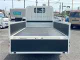 2025 Toyota Dyna Truck 1.4-ton 10-foot flatbed 4WD truck with reduced braking system and 5-speed manual transmission. White Truck for sale, Japanese used car export - photo 6 of 42 | GULJI TRADERS