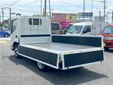 2025 Toyota Dyna Truck 1.4-ton 10-foot flatbed 4WD truck with reduced braking system and 5-speed manual transmission. White Truck for sale, Japanese used car export - photo 7 of 42 | GULJI TRADERS