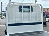 2025 Toyota Dyna Truck 1.4-ton 10-foot flatbed 4WD truck with reduced braking system and 5-speed manual transmission. White Truck for sale, Japanese used car export - photo 11 of 42 | GULJI TRADERS