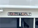 2025 Toyota Dyna Truck 1.4-ton 10-foot flatbed 4WD truck with reduced braking system and 5-speed manual transmission. White Truck for sale, Japanese used car export - photo 12 of 42 | GULJI TRADERS