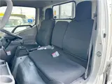 2025 Toyota Dyna Truck 1.4-ton 10-foot flatbed 4WD truck with reduced braking system and 5-speed manual transmission. White Truck for sale, Japanese used car export - photo 15 of 42 | GULJI TRADERS