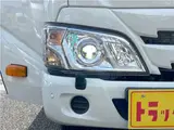 2025 Toyota Dyna Truck 1.4-ton 10-foot flatbed 4WD truck with reduced braking system and 5-speed manual transmission. White Truck for sale, Japanese used car export - photo 25 of 42 | GULJI TRADERS