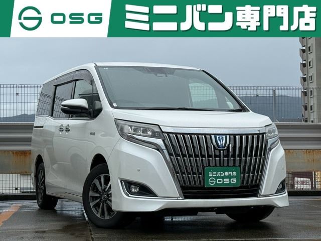 2018 Toyota Esquire 1.8 Hybrid Gi - photo 1 2018 Toyota Esquire 1.8 Hybrid Gi Sedan for sale, Japanese used car export - photo 1 of 68 | GULJI TRADERS