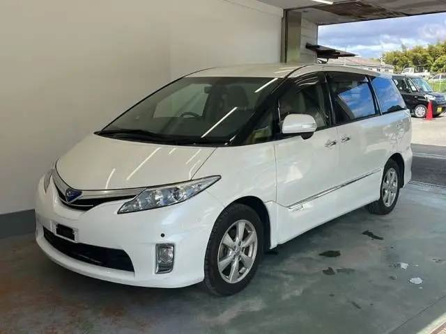 2009 Toyota Estima Hybrid G 4WD - photo 1 2009 Toyota Estima Hybrid G 4WD Pearl Van for sale, Japanese used car export - photo 1 of 8 | GULJI TRADERS