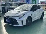 2023 Toyota GR Corolla 1.6 RZ 4WD, aftermarket alloy wheels, navigation system, ETC unit. Pearl Sedan for sale, Japanese used car export - photo 1 of 24 | GULJI TRADERS