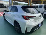 2023 Toyota GR Corolla 1.6 RZ 4WD, aftermarket alloy wheels, navigation system, ETC unit. Pearl Sedan for sale, Japanese used car export - photo 2 of 24 | GULJI TRADERS