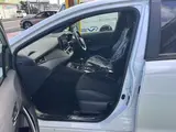 2023 Toyota GR Corolla 1.6 RZ 4WD, aftermarket alloy wheels, navigation system, ETC unit. Pearl Sedan for sale, Japanese used car export - photo 3 of 24 | GULJI TRADERS