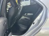 2023 Toyota GR Corolla 1.6 RZ 4WD, aftermarket alloy wheels, navigation system, ETC unit. Pearl Sedan for sale, Japanese used car export - photo 4 of 24 | GULJI TRADERS