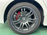 2023 Toyota GR Corolla 1.6 RZ 4WD, aftermarket alloy wheels, navigation system, ETC unit. Pearl Sedan for sale, Japanese used car export - photo 9 of 24 | GULJI TRADERS