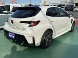 2023 Toyota GR Corolla 1.6 RZ 4WD, aftermarket alloy wheels, navigation system, ETC unit. Pearl Sedan for sale, Japanese used car export - photo 10 of 24 | GULJI TRADERS