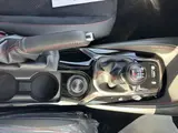 2023 Toyota GR Corolla 1.6 RZ 4WD, aftermarket alloy wheels, navigation system, ETC unit. Pearl Sedan for sale, Japanese used car export - photo 17 of 24 | GULJI TRADERS