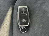 2023 Toyota GR Corolla 1.6 RZ 4WD, aftermarket alloy wheels, navigation system, ETC unit. Pearl Sedan for sale, Japanese used car export - photo 23 of 24 | GULJI TRADERS