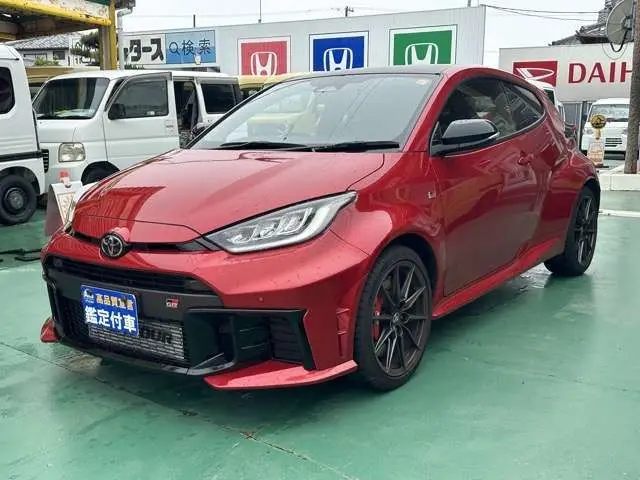 2025 Toyota GR Yaris 1.6 RZ High Performance 4WD Navi 6MT - photo 1 2025 Toyota GR Yaris 1.6 RZ High Performance 4WD Navi 6MT Red Coupe for sale, Japanese used car export | GULJI TRADERS