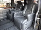 2021 Toyota Granace Premium, genuine navigation/TV, all-around view, flip-down monitor. Black Van for sale, Japanese used car export - photo 12 of 42 | GULJI TRADERS