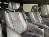 2023 Toyota Granace Premium / Rear seat monitor / Digital rearview mirror Black Van for sale, Japanese used car export - photo 13 of 31 | GULJI TRADERS