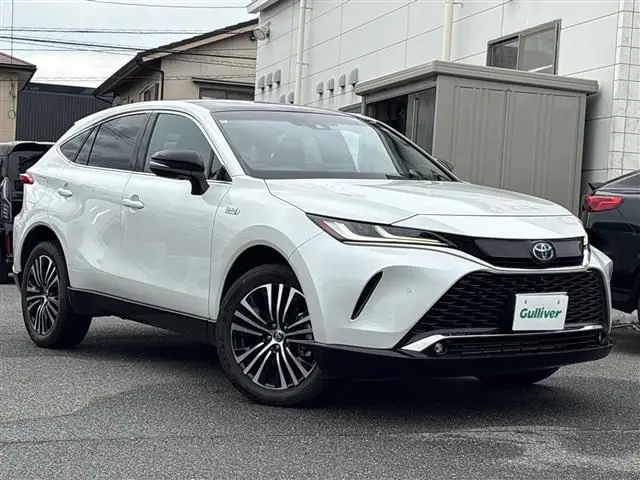 2023 Toyota Harrier Phev Z 4WD - photo 1 2023 Toyota Harrier Phev Z 4WD White SUV for sale, Japanese used car export - photo 1 of 24 | GULJI TRADERS