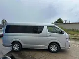 2026 Toyota Hiace GL 9-inch Bi-Beam LED Headlight Power Slide Silver Van for sale, Japanese used car export - photo 17 of 24 | GULJI TRADERS
