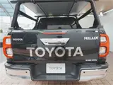 2022 Toyota Hilux Z Alpine 11-inch floating navigation system with full-segment TV, external and internal mounting. Black Truck for sale, Japanese used car export - photo 25 of 71 | GULJI TRADERS