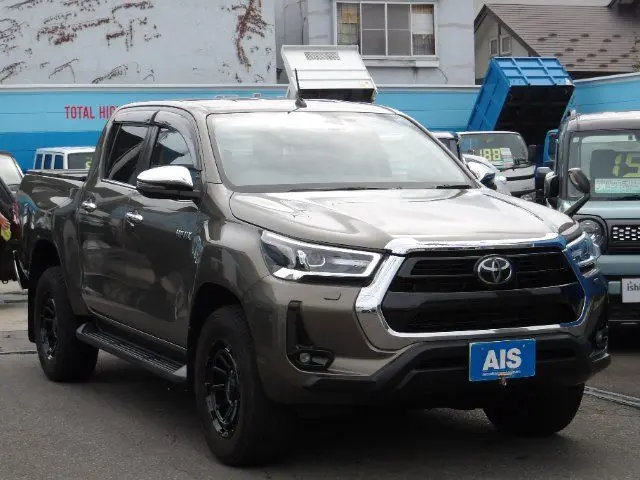 2022 Toyota Hilux 4WD Z - photo 1 2022 Toyota Hilux 4WD Z Brown Truck for sale, Japanese used car export - photo 1 of 24 | GULJI TRADERS