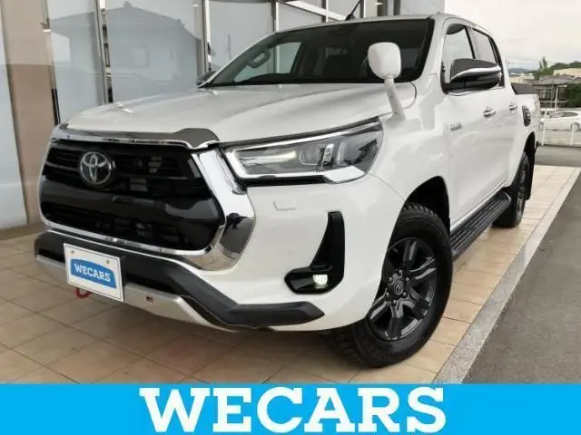 2022 Toyota Hilux 4WD_Z - photo 1 2022 Toyota Hilux 4WD_Z White Truck for sale, Japanese used car export - photo 1 of 9 | GULJI TRADERS