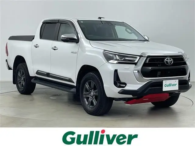 2023 Toyota Hilux Z 4WD - photo 1 2023 Toyota Hilux Z 4WD White Truck for sale, Japanese used car export - photo 1 of 23 | GULJI TRADERS