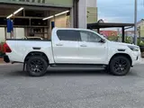 2023 Toyota Hilux Z GR Sport 4WD White Truck for sale, Japanese used car export - photo 21 of 22 | GULJI TRADERS