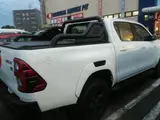 2023 Toyota Hilux 2400 Z GR SPORT 4-door 6-speed automatic 4WD 5-seater White Truck for sale, Japanese used car export - photo 2 of 3 | GULJI TRADERS