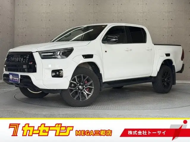 2023 Toyota Hilux 2.4 Z GR Sport Diesel Turbo 4WD - photo 1 2023 Toyota Hilux 2.4 Z GR Sport Diesel Turbo 4WD White Truck for sale, Japanese used car export - photo 1 of 20 | GULJI TRADERS