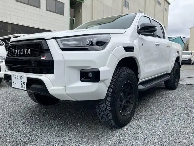 2023 Toyota Hilux Z GR Sport 4WD - photo 1 2023 Toyota Hilux Z GR Sport 4WD White Truck for sale, Japanese used car export - photo 1 of 9 | GULJI TRADERS