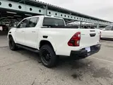 2023 Toyota Hilux Z GR Sport ★ 4WD ★ Cold Weather Specification ★ White Truck for sale, Japanese used car export - photo 2 of 9 | GULJI TRADERS