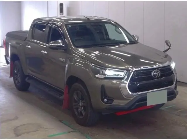 2023 Toyota Hilux Z 4WD - photo 1 2023 Toyota Hilux Z 4WD Green Truck for sale, Japanese used car export - photo 1 of 3 | GULJI TRADERS