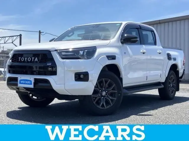 2023 Toyota Hilux 4WD_Z_GR Sport - photo 1 2023 Toyota Hilux 4WD_Z_GR Sport White Truck for sale, Japanese used car export - photo 1 of 9 | GULJI TRADERS