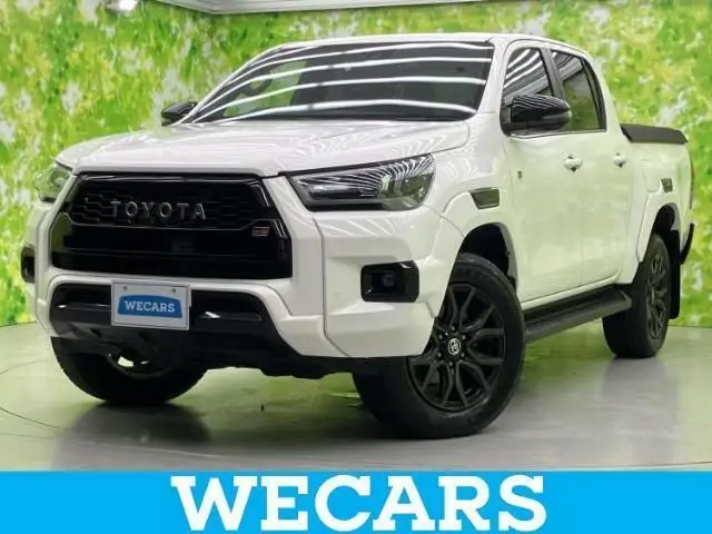 2023 Toyota Hilux 4WD_Z_GR Sport - photo 1 2023 Toyota Hilux 4WD_Z_GR Sport White Truck for sale, Japanese used car export - photo 1 of 9 | GULJI TRADERS