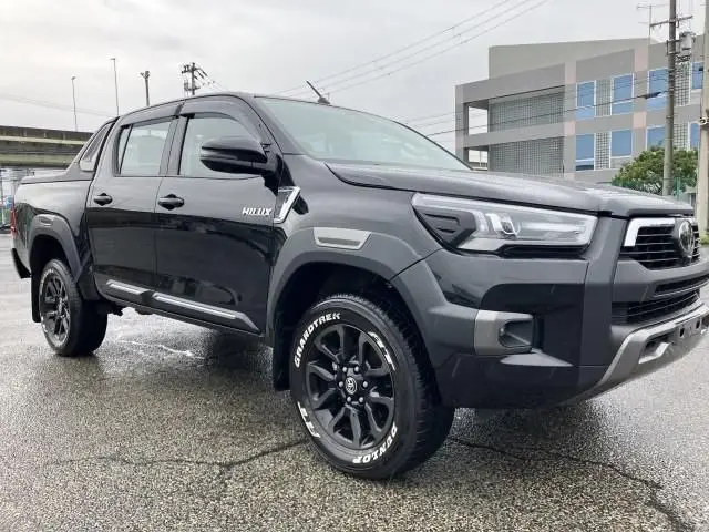 2024 Toyota Hilux Revolocco Edition 4WD - photo 1 2024 Toyota Hilux Revolocco Edition 4WD Black Truck for sale, Japanese used car export - photo 1 of 9 | GULJI TRADERS