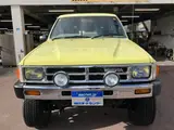1988 Toyota Hilux Surf SSR NOx PM compliant lift-up Yellow Color changed Truck for sale, Japanese used car export - photo 3 of 9 | GULJI TRADERS