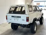 1988 Toyota Hilux Surf 4WD White Truck for sale, Japanese used car export - photo 3 of 5 | GULJI TRADERS