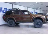 1996 Toyota Hilux Surf SSR-X aftermarket navigation system/TV, lift-up kit. Brown Color changed Truck for sale, Japanese used car export - photo 4 of 9 | GULJI TRADERS