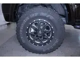1996 Toyota Hilux Surf SSR-X aftermarket navigation system/TV, lift-up kit. Brown Color changed Truck for sale, Japanese used car export - photo 9 of 9 | GULJI TRADERS