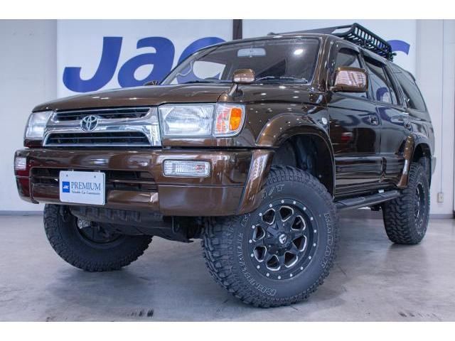 1996 Toyota Hilux Surf SSR-X aftermarket navigation system/TV, lift-up kit. Brown Color changed Truck for sale, Japanese used car export | GULJI TRADERS