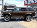 1998 Toyota Hilux Surf SSR-G full paint job, lift kit, aftermarket alloy wheels Brown Truck for sale, Japanese used car export - photo 2 of 52 | GULJI TRADERS