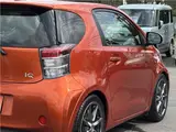2010 Toyota IQ 130G MT → (Go) Leather Package Orange Sedan for sale, Japanese used car export - photo 57 of 79 | GULJI TRADERS