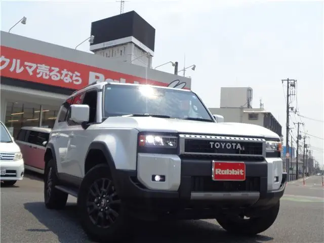 2025 Toyota Land Cruiser VX★Sunroof/All-around/Digital Inner/BSM - photo 1 2025 Toyota Land Cruiser VX★Sunroof/All-around/Digital Inner/BSM Pearl Jeep for sale, Japanese used car export - photo 1 of 53 | GULJI TRADERS