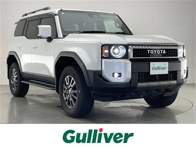 2025 Toyota Land Cruiser VX 4WD - photo 1 2025 Toyota Land Cruiser VX 4WD White Jeep for sale, Japanese used car export - photo 1 of 23 | GULJI TRADERS