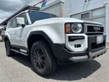 2026 Toyota Land Cruiser VX Toyota Teammate / Modellista Protector / Signature Illumination / Round Headlights Pearl Jeep for sale, Japanese used car export - photo 1 of 65 | GULJI TRADERS