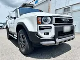 2026 Toyota Land Cruiser VX Toyota Teammate / Modellista Protector / Signature Illumination / Round Headlights Pearl Jeep for sale, Japanese used car export - photo 2 of 65 | GULJI TRADERS