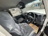 2026 Toyota Land Cruiser 2.8 AX Diesel Turbo 4WD White Jeep for sale, Japanese used car export - photo 24 of 56 | GULJI TRADERS