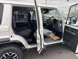 2026 Toyota Land Cruiser 2.8 AX Diesel Turbo 4WD White Jeep for sale, Japanese used car export - photo 26 of 56 | GULJI TRADERS