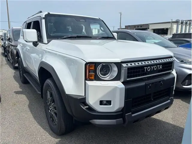 2026 Toyota Land Cruiser VX White Jeep for sale, Japanese used car export - photo 1 of 21 | GULJI TRADERS