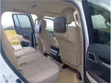 2026 Toyota Land Cruiser Rear entertainment system / Cool box / Modellista / ZX Pearl Jeep for sale, Japanese used car export - photo 11 of 32 | GULJI TRADERS