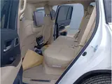 2026 Toyota Land Cruiser Rear entertainment system / Cool box / Modellista / ZX Pearl Jeep for sale, Japanese used car export - photo 13 of 32 | GULJI TRADERS